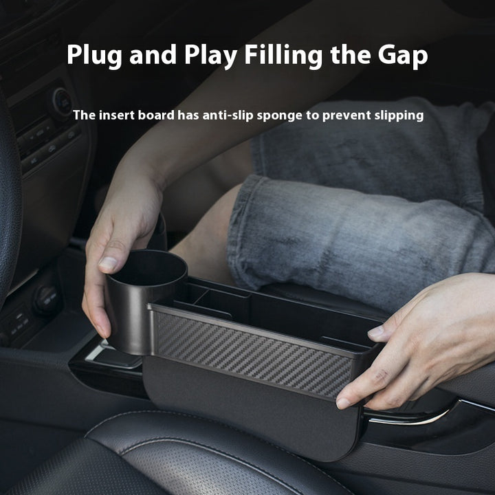 Person using a black car seat gap organizer with anti-slip sponge in vehicle, demonstrating easy installation and functionality.